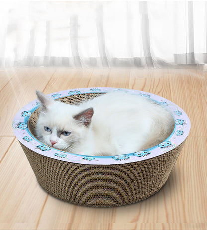 鉢型の爪とぎベッドに入っている猫